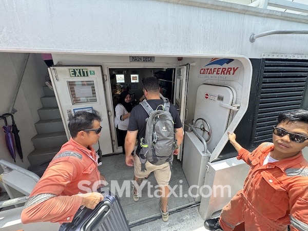 Board to Cataferry in Tekek Jetty