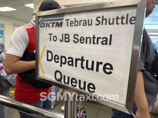 Train to JB departure queue sign.
