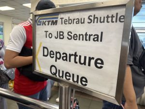 Train to jb Departure Queue sign